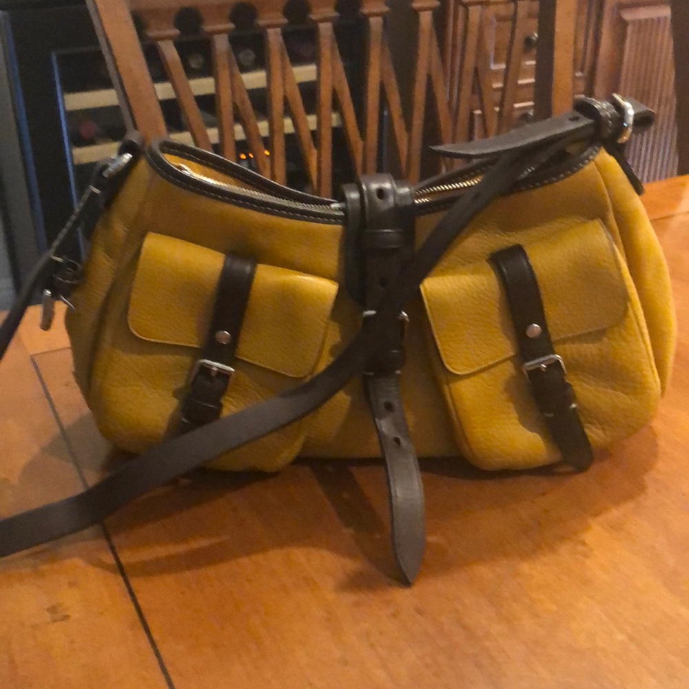 Tumi pebble leather crossbody handbag